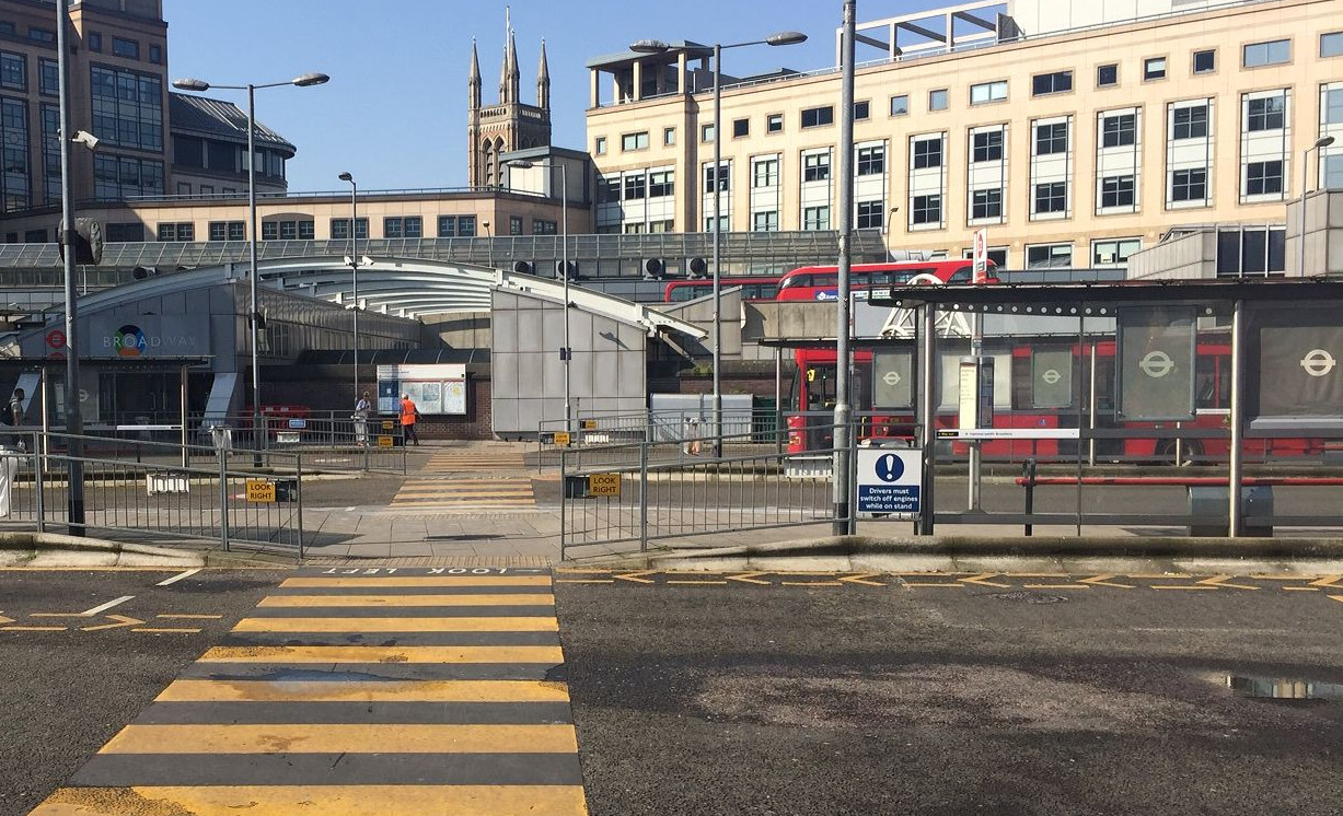 Red London buses at Hammersmith lower bus station