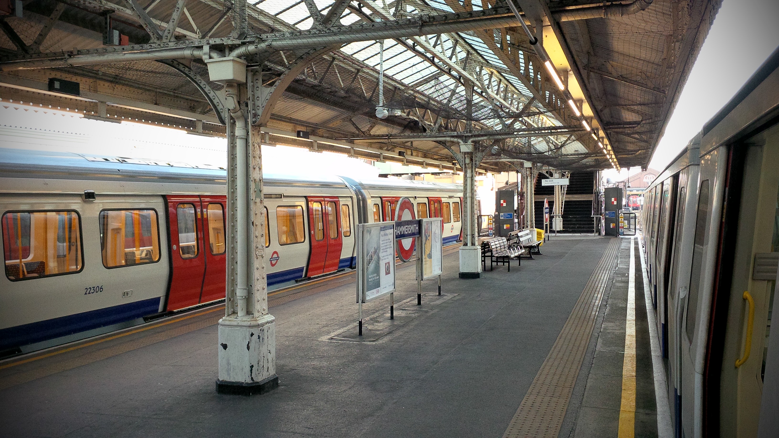 Trains and Hammersmith roundel inside the Circle and Hammersmith and City station